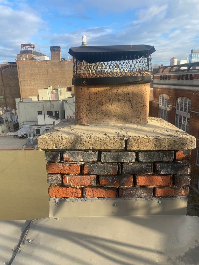 Chimney service being carried out by Morrisania Roofing professionals